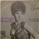 Shirley Bassey - To Give / My Love Has Two Faces (From The Film 