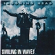 Laughing Head - Smiling In Waves